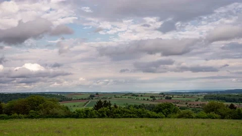 Clouds moving across the fields Stock Footage 131866671