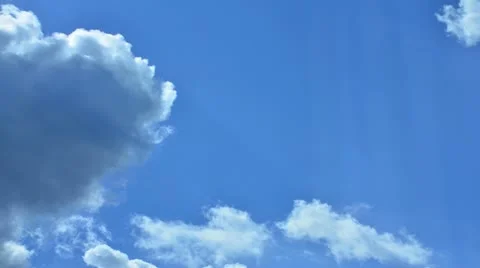 Clouds moving across sky with sun rays (Timelapse)1 Stock Footage 12518669