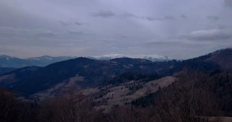 Clouds Moving Across a Snowy Mountains Landscape Stock Footage 62015234