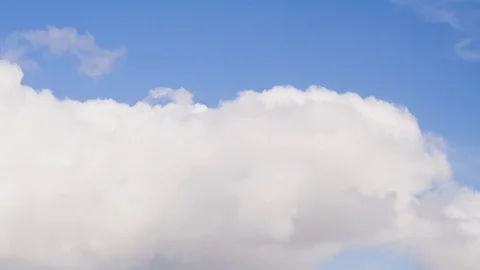 Clouds moving and bubbling with blue sky Timelapse Stock Footage 90387565