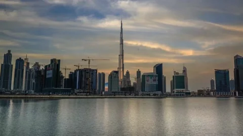 Clouds moving around the Dubai Downtown District Stock Footage