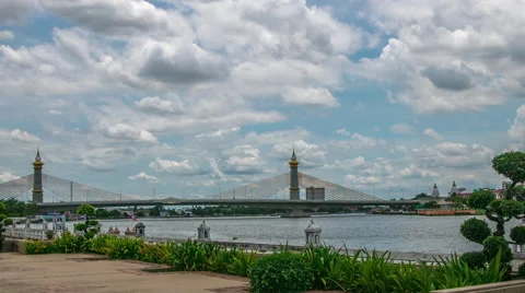 Clouds moving around the river with Boats carrying sand Stock Footage 66668326