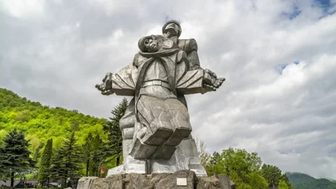 Clouds moving behind the Monument to the Great Patriotic War in Dilijan Stock Footage 190954656