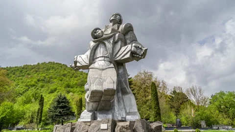 Clouds moving behind the Monument to the Great Patriotic War in Dilijan Stock Footage 191019490