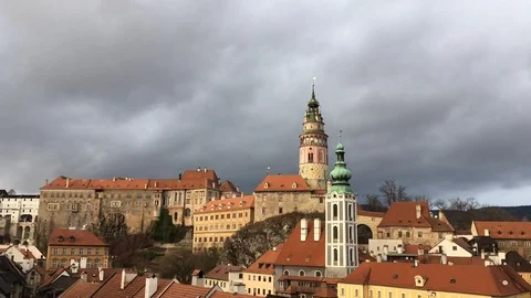 Clouds moving behind tower in Cesky Krumlov UNESCO city Stock Footage 107097068