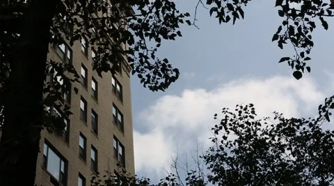 Clouds moving beyond building Stock Footage 60115009