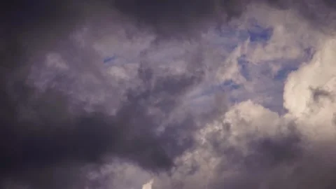 Clouds moving in the blue sky and a bird fly passing by Video stock 280699034