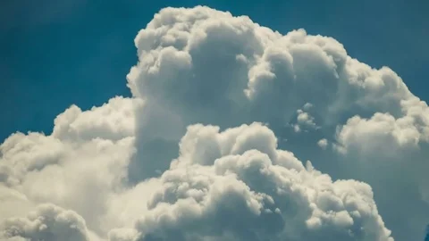 Clouds moving on the blue sky, time lapse Stock Footage 76044598