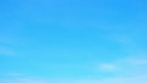Clouds moving in the blue sky time-lapse Video stock 244294950