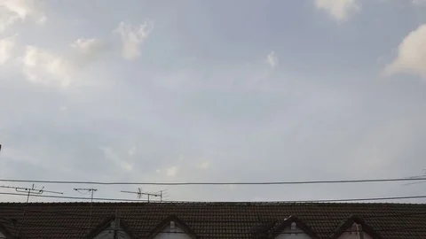 Clouds moving fast above Stock Footage 79514717