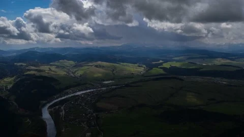 Clouds moving fast and close to the hill Stock Footage 132241487