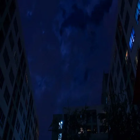 Clouds moving fast in front of the full moon Stock Footage 69610765