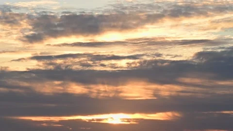 Clouds moving in fast motion with a beautiful sunset Stock Footage 231569876