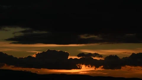 The Clouds Moving Fast In The Night Sky Over The Mountin 1 Stock Footage 141055918