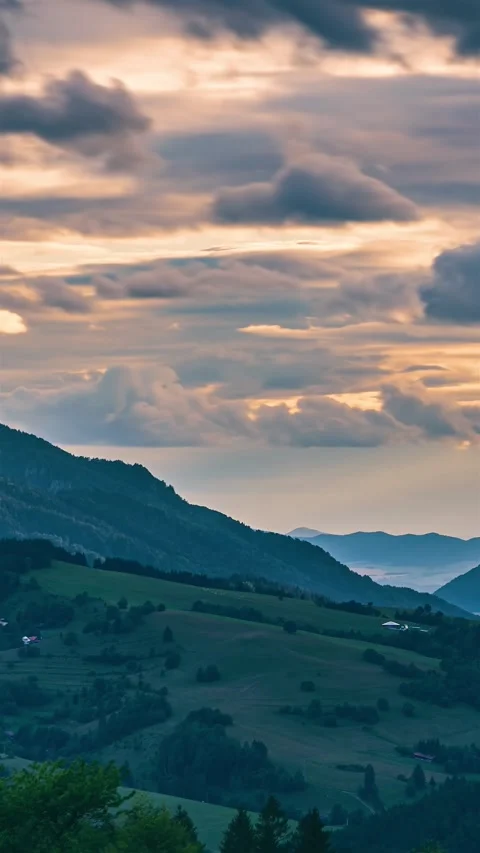 Clouds Moving Fast over Alpine Countryside at Sunset, Vertical Timelapse Stock Footage 311574195