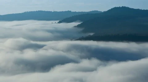 Clouds moving in german valley of river Mosel at sunrise Stock Footage 41345705