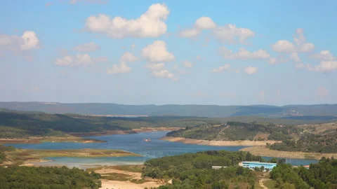 Clouds moving on the lake. Time Lapse. Stock Footage 132574604