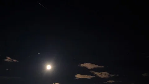 Clouds moving on moon in the dark sky. Timelapse video Stock Footage 93514174