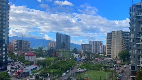 Clouds moving over Batumi skyline, wide timelapse view Stock Footage 345361750