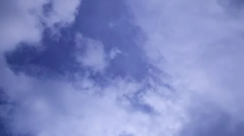 Clouds moving over blue sky Stock Footage 8847774