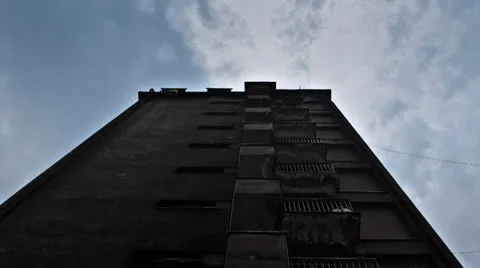 Clouds moving over the building in one of the socialist's district of the city Stock Footage 22482252