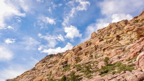 Clouds Moving Over the Edge of Red Rock Canyon in 4K Stock Footage 88878071