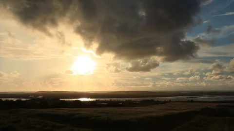 Clouds Moving Over The Field With Sun 스톡 동영상 105229839