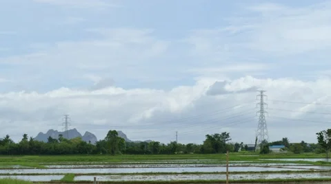 Clouds moving over the green field. Stock Footage 53093335