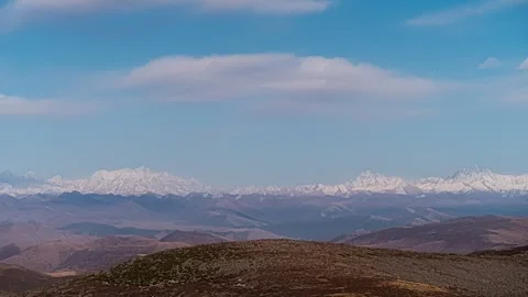 Clouds Moving Over Highland Snowy Mountains Timelapse Stock Footage 326700759