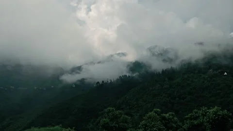 Clouds moving over the hills in Mussoorie, Uttarakhand, India Video stock 138258588