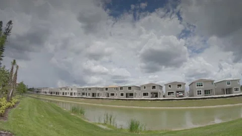 Clouds Moving Over Houses Under Construction Rain Band Time Lapse Stock Footage 169750815