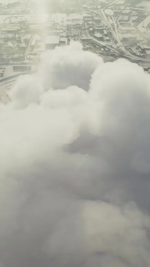 Clouds moving over industrial area in winter Stock Footage 307136528