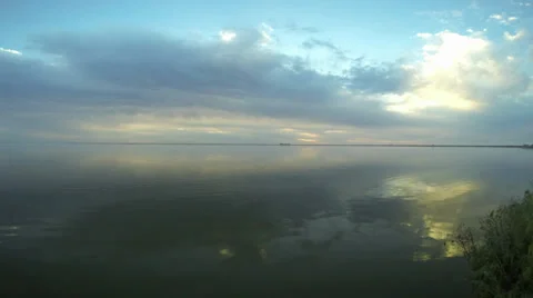 Clouds moving over the lake Stock Footage 38696084