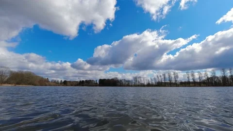 Clouds moving over a lake in winter time lapse Stock-Footage 150666640