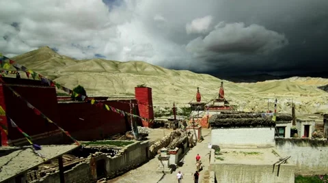 Clouds moving over monastery and Himalaya mountains in Mustang, Nepal Stock Footage 62923868