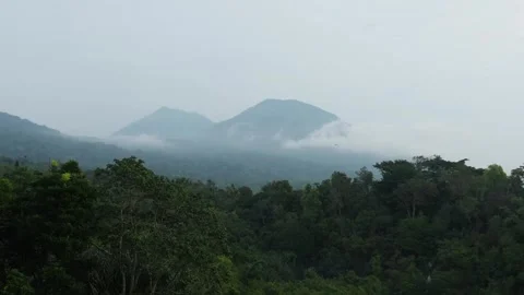 Clouds moving over mount batur in bali, indonesia Stock Footage 306461621
