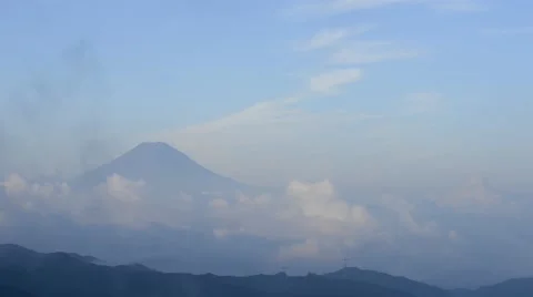 Clouds moving over Mount Fuji on a summer morning after sunrise, Yamanashi Video stock 58466447