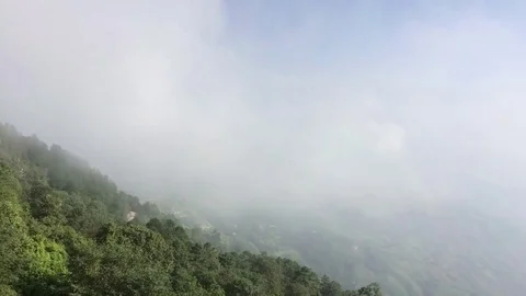 Clouds Moving over the Mountain Stock Footage 73787091