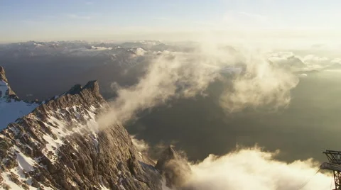 Clouds moving over mountain peak Stock Footage 58647180