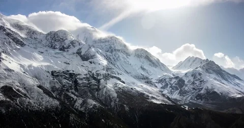 Clouds moving over mountain peak Stock Footage 79605653
