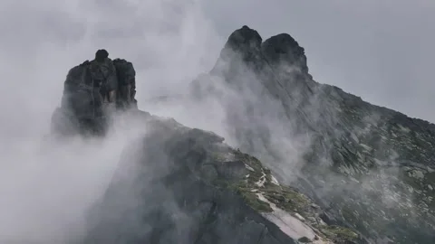 Clouds moving over mountain peaks in ergaki nature park Video stock 300938831