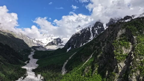Clouds moving over mountain valley timelapse Stock Footage 318867699