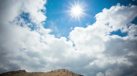 Clouds moving over mountain,people walking 4k:time lapse Stock Footage 52040688