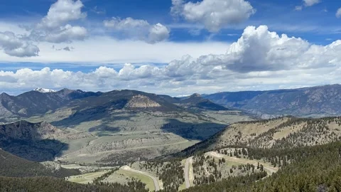 Clouds Moving Over Mountains And Road Stock Footage 156413829