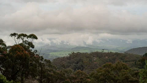 Clouds moving over mountains Video stock 154806210