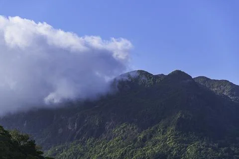 Clouds Moving Over The Mountains Stock Photos