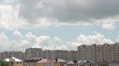 Clouds Moving over the Multistorey Buildings Time Lapse Stock Footage 63168226