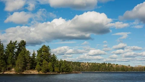 Clouds Moving Over a Remote Lake Stock Footage 99272723