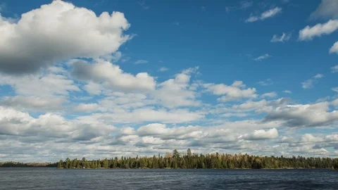 Clouds Moving Over a Remote Lake Stock Footage 99275028