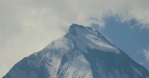Clouds moving over the snow covered Annapurna mountain Stock Footage 145269408